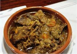 Conejo sabroso en adobo canario, ‘En la cocina’